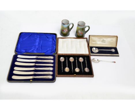 A cased George V hallmarked silver presentation spoon inscribed 'Darlington' with enamelled crest and portrait of George Step