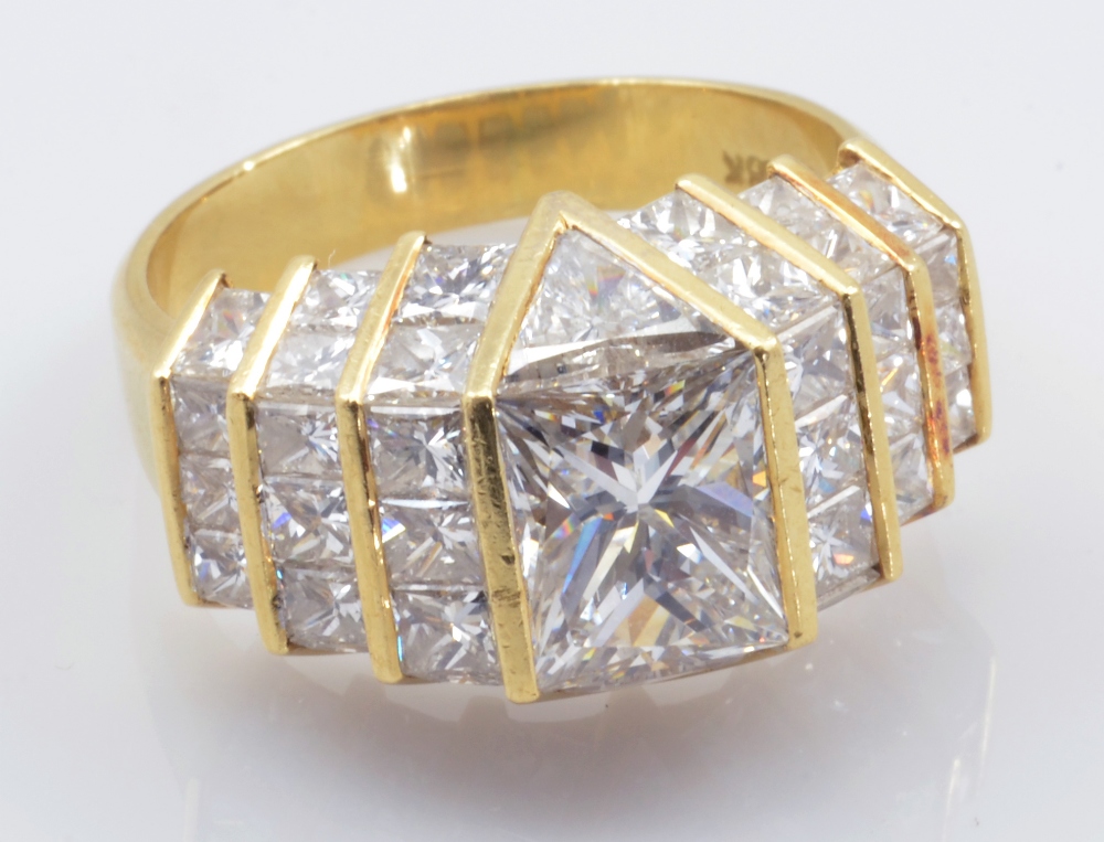 An impressive yellow gold and quadrillion cut diamond ring of stepped ...