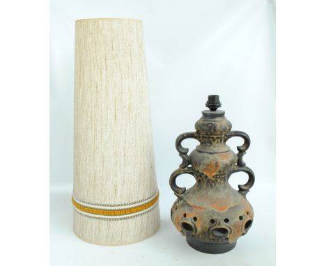 A retro West German lamp with large tapering cone shaped shade and pierced form to the base.