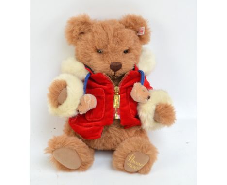 A Steiff button-in-ear 'Benjamin' 2007 Christmas teddy bear for Harrods, with growler and reddish brown fur, in plush coat, l