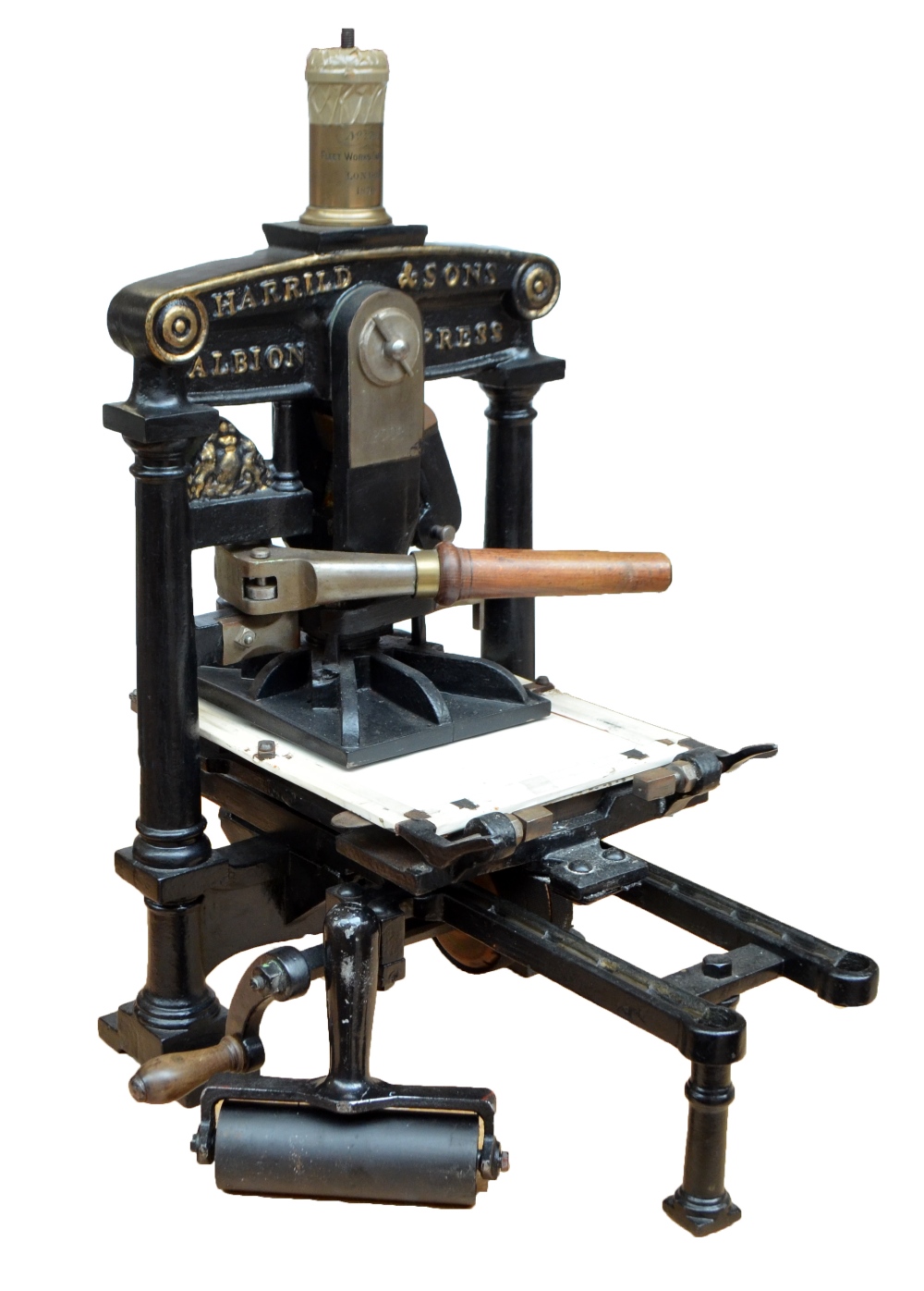 A large brass detailed and cast iron black painted press with twin ...