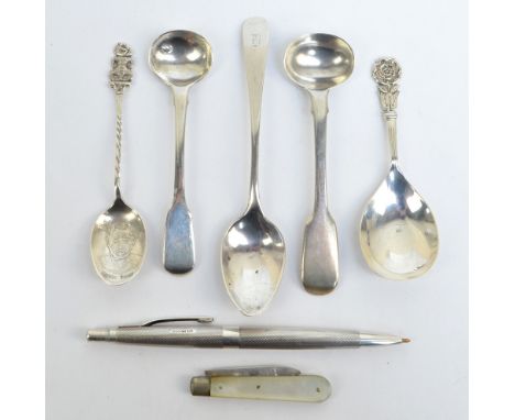 A small quantity of hallmarked silver spoons including a Victorian fiddle pattern condiment spoon, H.J. Lias & Son, London 18