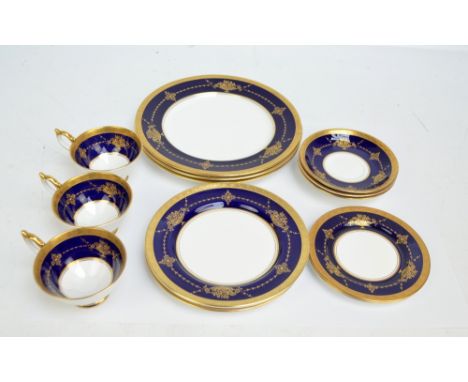 A set of Aynsley 'Regent' pattern teaware, comprising three cups and saucers, two plates, three larger examples and three din