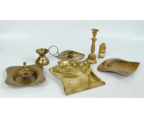 A quantity of brass ware including and Arts and Crafts style crumb scoop, chamber stick with stylised Art Nouveau motifs to t