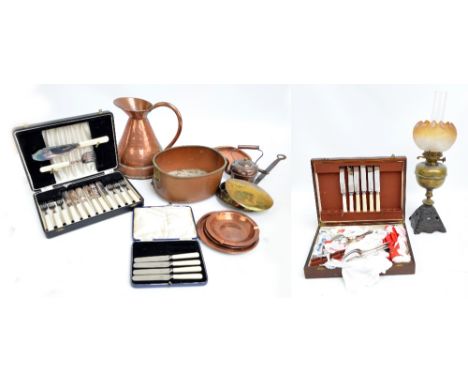 A small quantity of metalware including a copper haystack measure, brass chestnut roaster, copper pan lids, also an oil lamp,