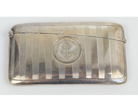 WILLIAM NEALE; a George V hallmarked silver rectangular card case of curved form with linear engine turned decoration, centre