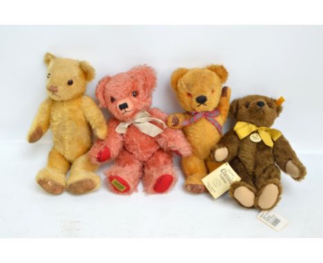 Four mohair jointed teddy bears comprising a Steiff button-in-ear brown mohair '1909 Classic Teddybär' teddy bear in brown mo