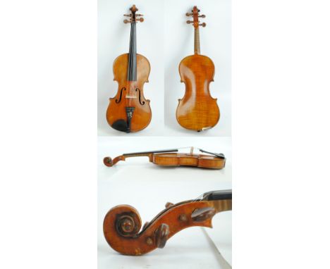 An early 20th century full size German Stradivarius copy violin, with two-piece back, length 35.5cm, cased with a bow.   COND