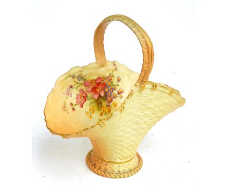 A Royal Worcester ceramic basket decorated with painted posies with gilded edges, with puce mark to base for 1908, height 19c