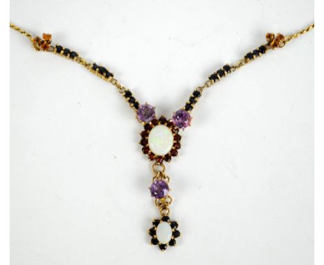 A 9ct yellow gold necklace with opal pendant surrounded by garnets, purple hard stones and a further opal pendant drop with o