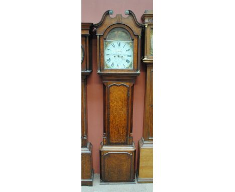 A 19th century oak and mahogany crossbanded longcase clock, the broken swan neck pediment above arched repainted dial now ins