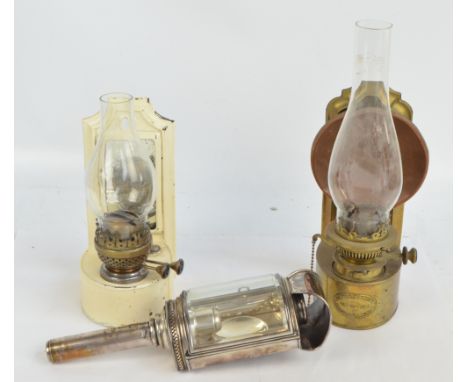 A plated carriage lamp with loop back fastening, height 34cm, a brass and copper wall mounted oil lamp with plaque inscribed 