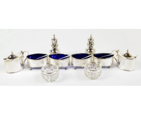 R & W SORLEY; a George V hallmarked silver eight piece cruet set comprising a pair of baluster peppers, a pair of oval mustar