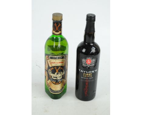A single bottle of Glenfiddich 'Over Eight Years Pure Malt Scotch Whisky' 75cl, and a bottle of Taylor's 'First Estate Reserv