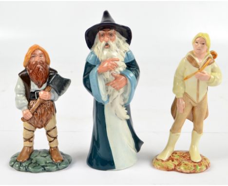 Three Royal Doulton Lord Of The Rings figures; HN2911 'Gandalf', HN2917 'Legolas' and HN2922 'Gimli' (3).   CONDITION REPORT: