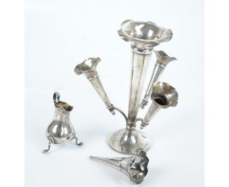 HARRISON & HIPWOOD; an Edward VII hallmarked silver three branch epergne with flared wavy rims, on spreading circular loaded 