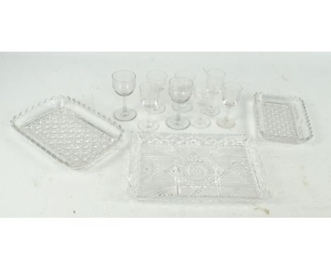 A small quantity of clear cut and pressed glass to include eight wheel engraved wine glasses of various sizes, a clear cut gl