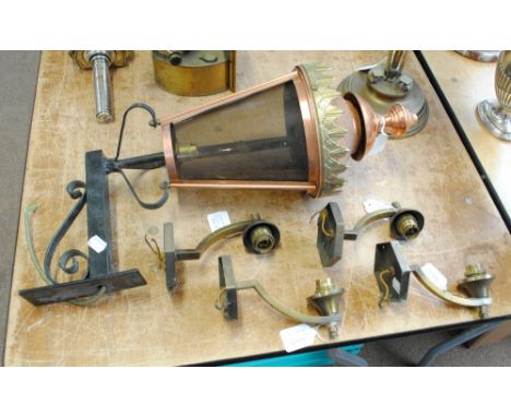 An electric copper and brass lantern on iron bracket, height 60cm, and a set of four Art Deco wall sconces (5).