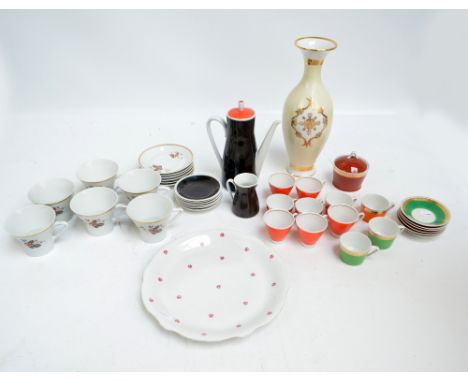 A Freiberger Porzellain Art Deco style coffee set comprising pot, cream jug, five cups and six saucers, also a further quanti