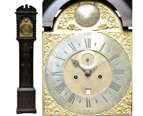 A carved oak longcase clock with arched brass dial inscribed 'Tho Wightman, George Yard, Lumbard Street, London' with subsidi