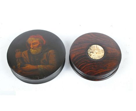 An early 19th century circular rosewood snuff box, the lid set with an ivory roundel inscribed 'Lancaster Castle' and depicti