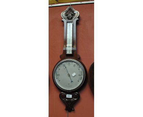 An early 20th century foliate carved mahogany banjo barometer/thermometer, height 78cm.