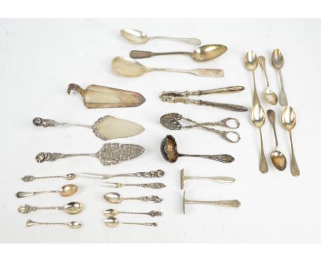 A group of various continental electroplated servers to include cake tongs, a large spoon and a sifting spoon, and a set of s
