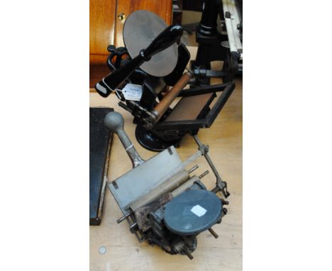 A vintage Goldinge Co of Boston printing press and a further small press (2).