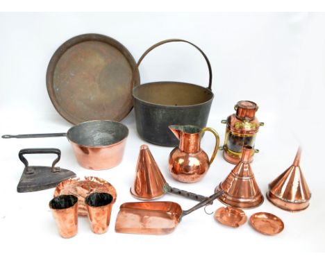 A small quantity of metalware including a copper mast head lamp of small proportions, copper jug with brass handle, conical f