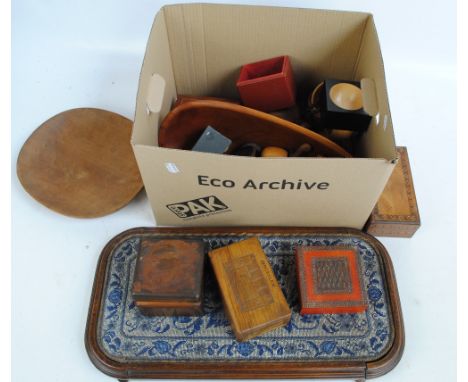 A quantity of treen including a Victorian bead work decorated tray, various trinket boxes, wooden bowls, etc.