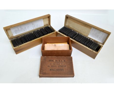Two boxes of Magic Lantern slides, views around the world including lumberjack, kangaroo hunting, Native Americans, also a se