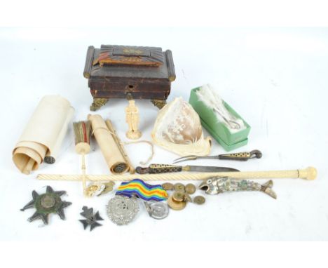 An interesting group of collectors' items including a marine ivory walking cane (broken and section only), a carved shell, a 