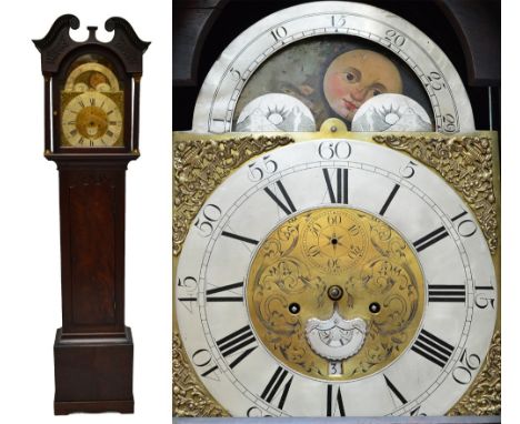 An early 19th century mahogany longcase clock, the broken swan neck pediment above arched dial with eight day movement and pa