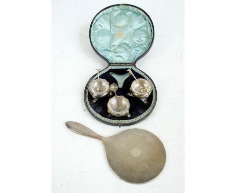 CHARLES STUART HARRIS; a set of three Victorian hallmarked silver open circular salts, raised on three scallop knee outswept 