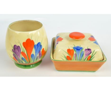 CLARICE CLIFF; a Newport Pottery crocus decorated butter dish of rounded square section form, width 11cm, also a Clarice Clif