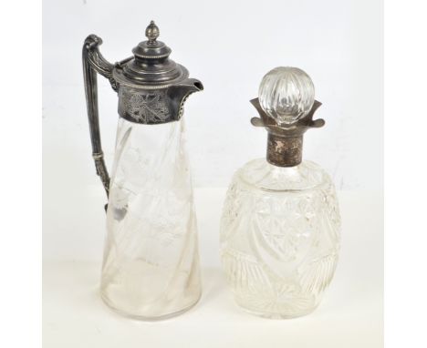 A cut glass decanter with hallmarked silver fluted neck, height 27cm, and a tapering etched glass claret jug with silver plat