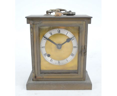 An early 20th century brass eight day fusee mantel clock, the circular silvered chapter ring set with Roman numerals, height 