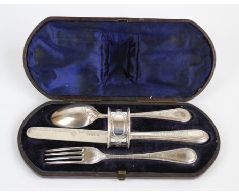 MARTIN, HALL & CO; a cased Victorian hallmarked silver four piece christening set comprising a knife, length 20cm, a spoon, a