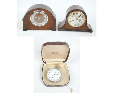 A 1920s oak dome top mantel clock with silvered dial set with Arabic numerals and inscribed 'Wales & McCulloch Ltd', height 2