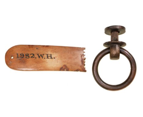 Crimean War relics. The bone handle of a British solder's accoutrement inscribed 1982 W. H. and a brass ring, stamped Governm