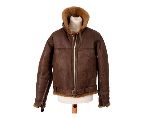 Militaria. A WWII RAF Irvin style brown leather flying jacket, size 4, an RAF leather C-type flying helmet, marked with broad