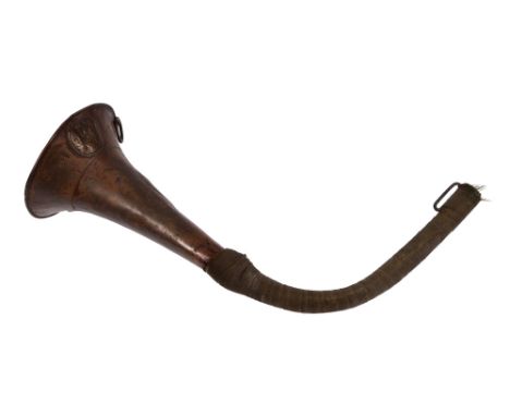 An Imperial Russian Jager brass and green cotton tape-bound bugle horn, c1850&nbsp;&nbsp;  Provenance: The descendant's of Ma