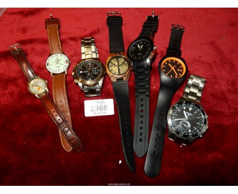 A box of watches including Fossil, Rotary, etc.