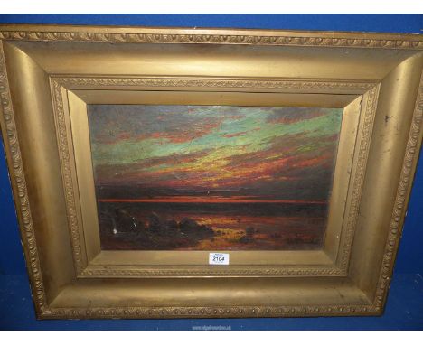 A heavy gilt framed Oil on canvas depicting Seascape at sunset, signed lower right R.C. Markham, some damage.