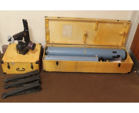 A RUSSIAN MADE AMATEUR ASTRONOMICAL TELESCOPE in fitted wooden case, with bracket in separate fitted case, along with a box o