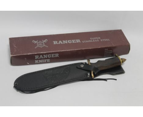 A RANGER BOWIE / HUNTING KNIFE, in leather scabbard, with box