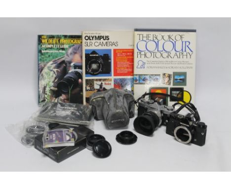 AN OLYMPUS OM-1 CAMERA BODY, an Olympus OM-2n with 50 mm lens, various filters and other accessories