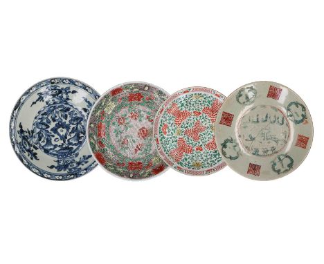 Lot of two famille verte porcelain deep chargers, decorated with flowers. Unmarked. China, Kangxi. Added two Sawankhalok deep