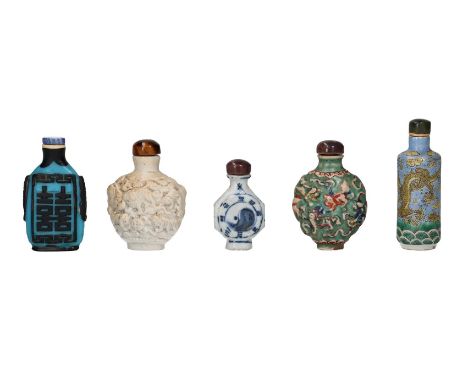 Lot of five snuff bottles 1) porcelain relief decoration with lions and a tiger eye cap 2) polychrome porcelain, with seal ma