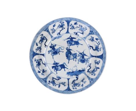 A blue and white porcelain deep charger, decorated with horsemen, flowers and birds. Marked with 6-character mark. China, Kan